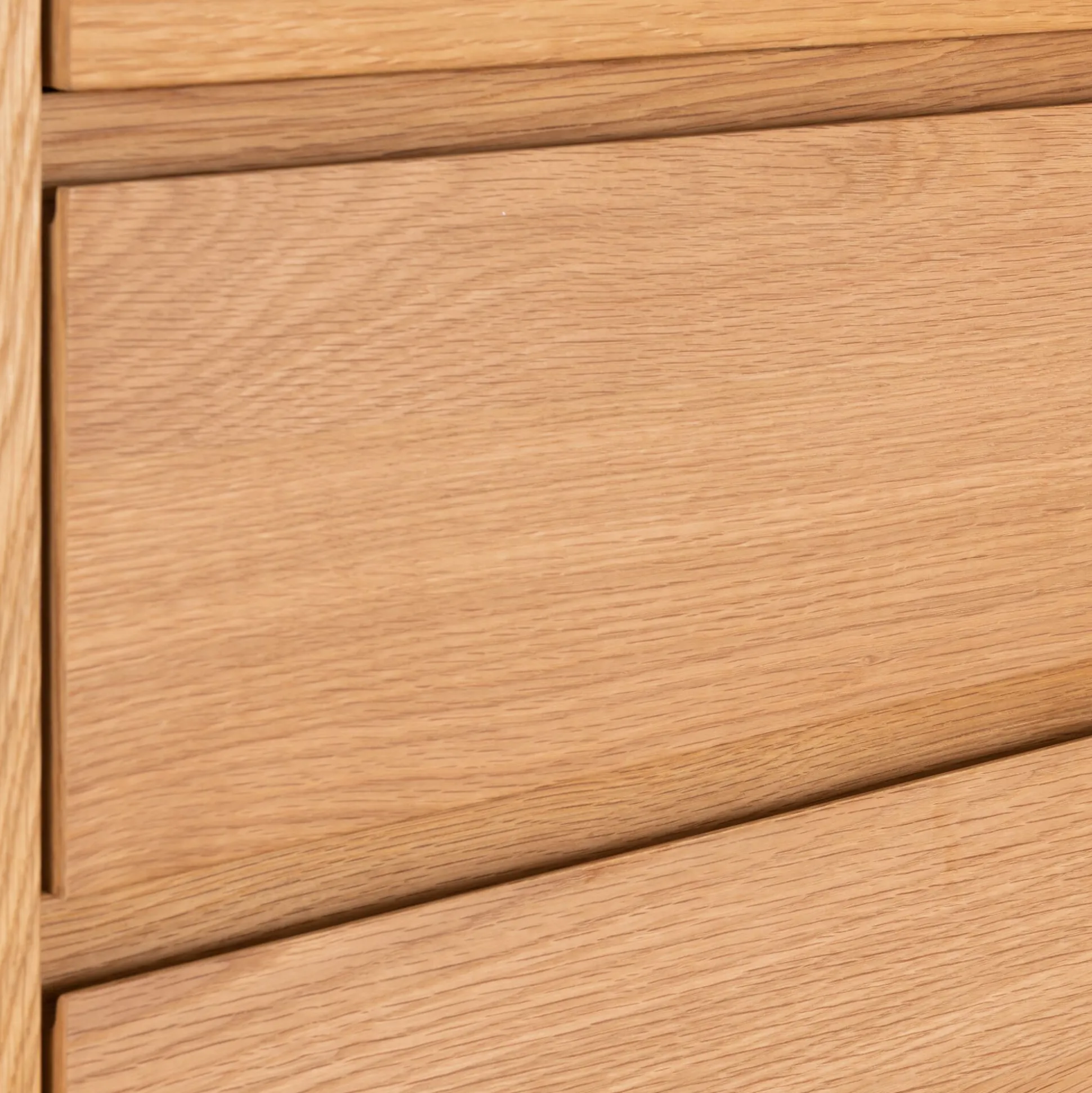 Commode 4 tiroirs en plaqué chêne - bois clair