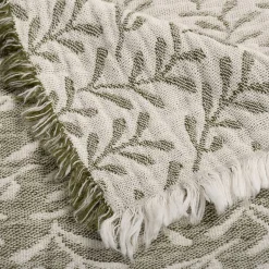 Plaid en coton motif feuilles finition franges 130x170cm - vert
